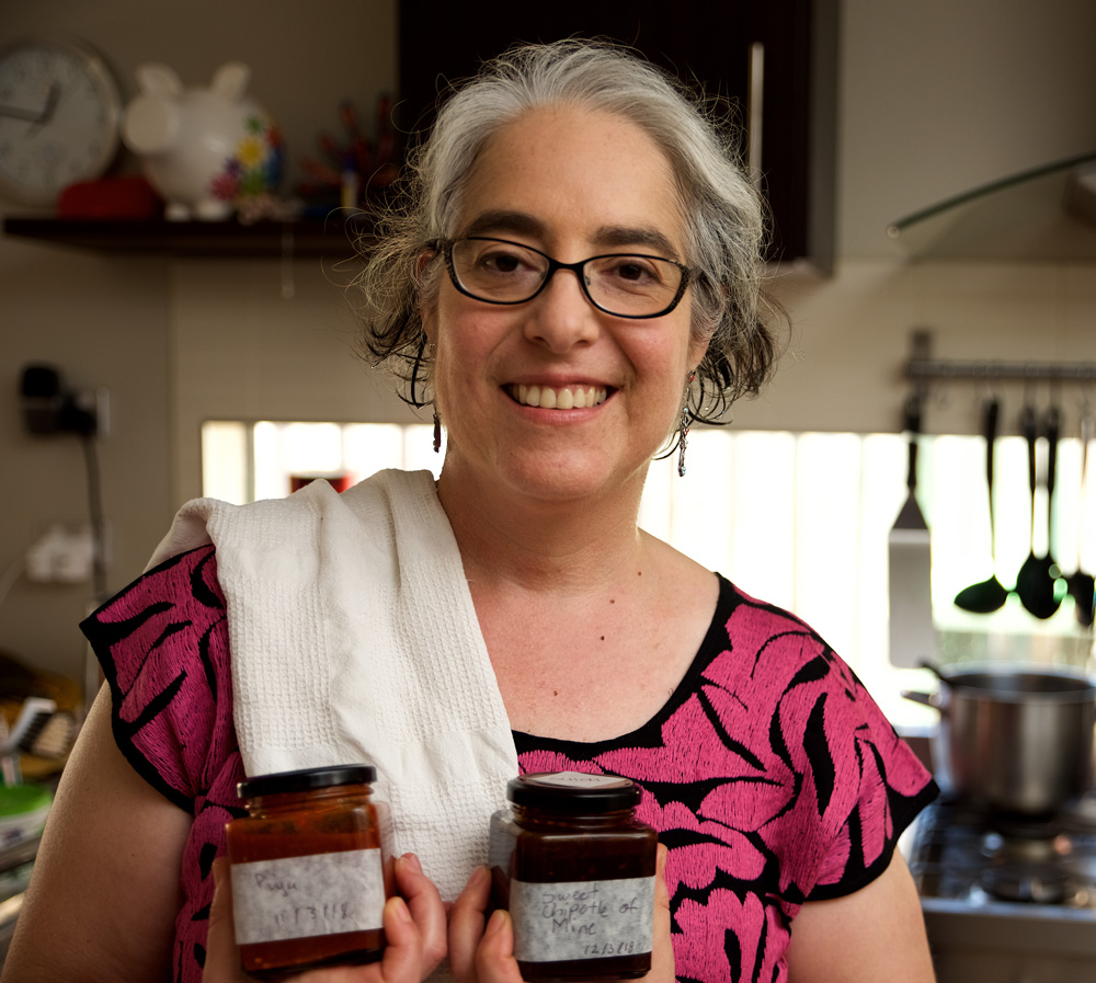 This is a photo of Ita, a Stepping Stones Participant with her business products