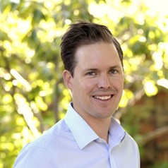 Portrait photo of Travers McLeod, Executive Director of BSL.