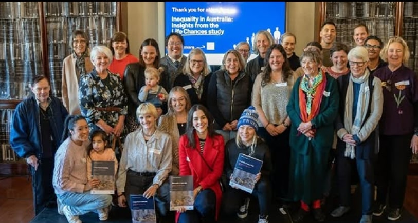 Photo of research study participants and authors at the event. 